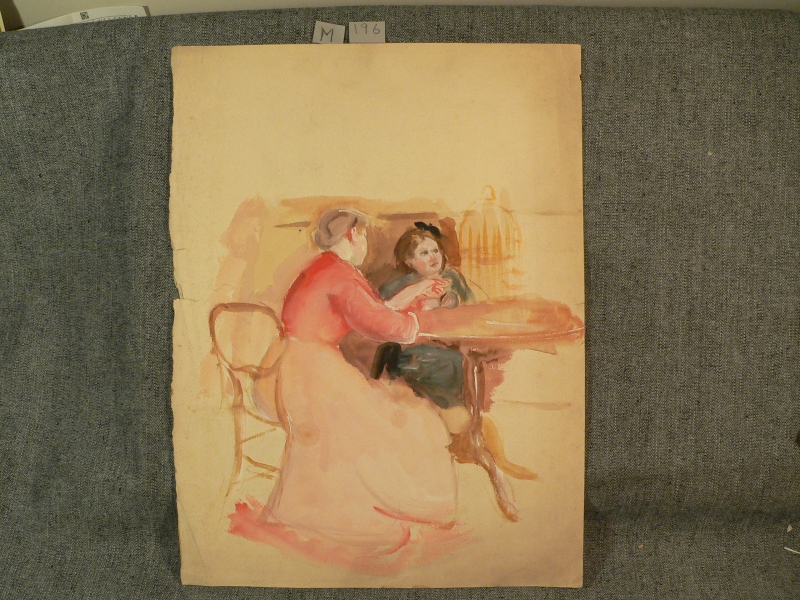 Woman and child seated at table with a birdcage