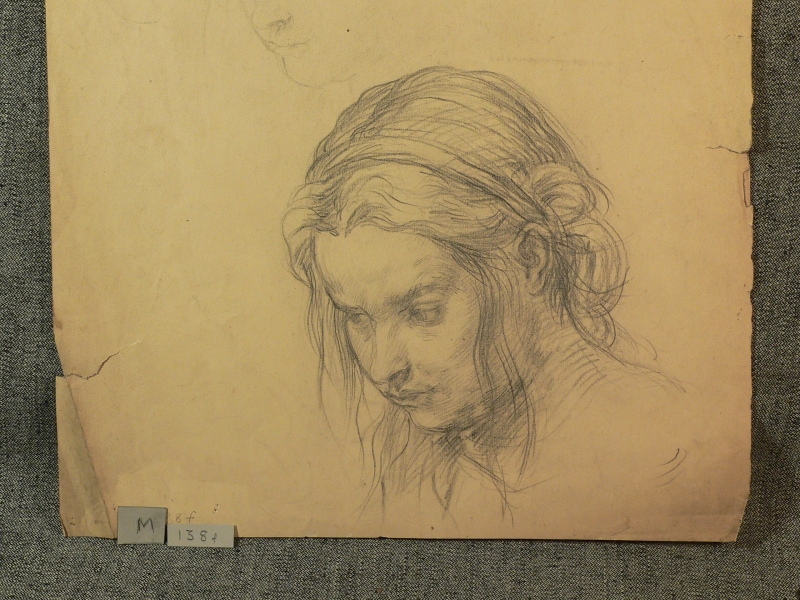 Recto: Pencil drawing of young girl facing down:  Verso Idem